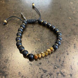 Black and Gold Beaded Bracelet on adjustable Rope